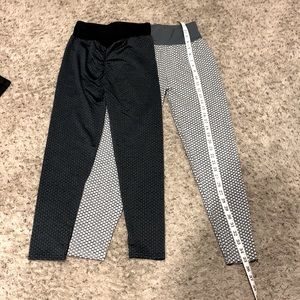 Two pairs of workout leggings patterned material with cinched butt